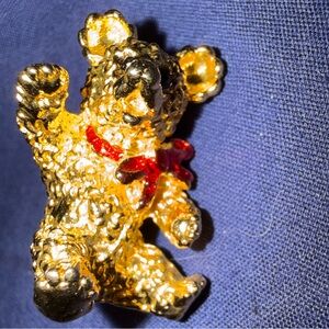1997 Gold tone Teddy Bear Brooch with Red Bow